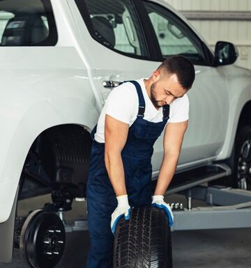 front-view-car-service-male-mechanic_23-2148327593.jpg